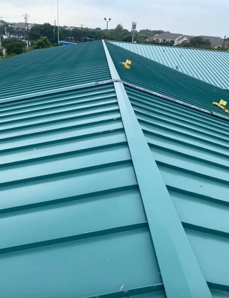 Green commercial metal roof ridge and valley for Metal Roof Repair in Providence